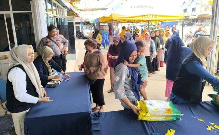 400-Karung-Beras-Habis-Terjual-pada-Gerakan-Pangan-Murah-Polsek-Tenayan-Raya.jpg