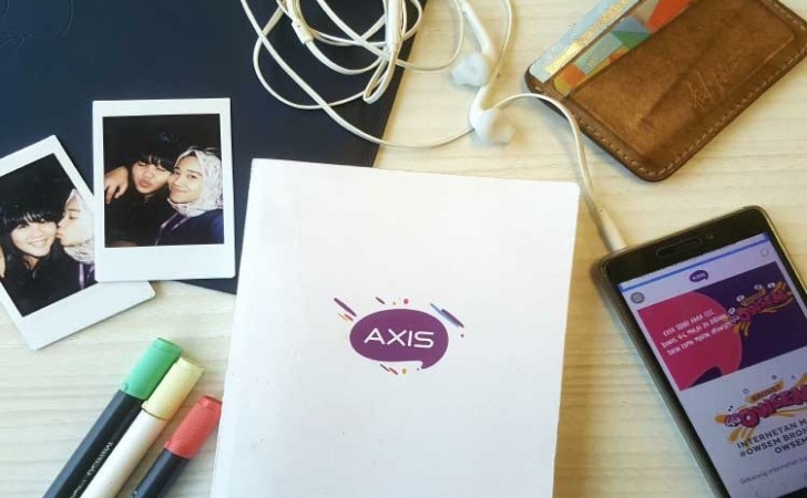 Adv-Axis-Senin-12-Maret-2018.jpg