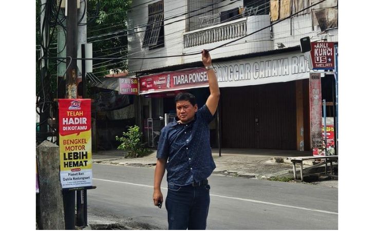 Aidhil-meninjau-kabel-menjuntai.jpg