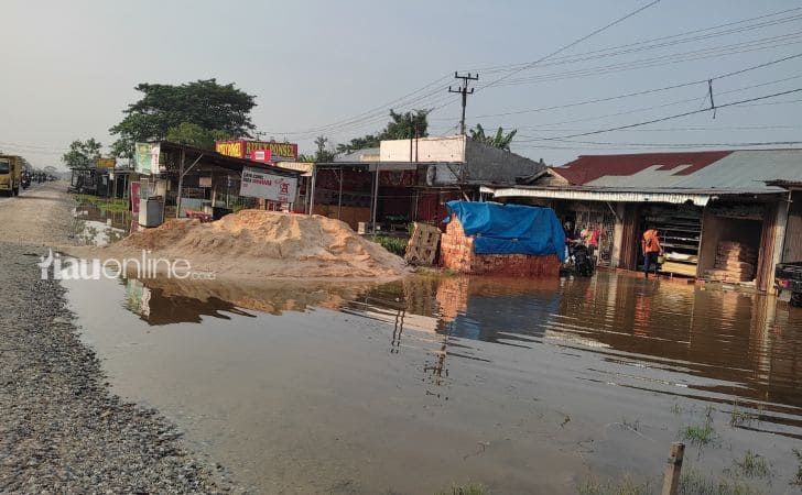 Banjir-karena-sungai-meluap.jpg