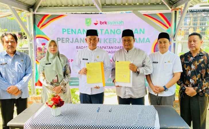 Bapenda-Inhu-dan-BRK-Syariah-Teken-Kerja-Sama-Pembayaran-Pajak-Secara-Elektronik.jpg
