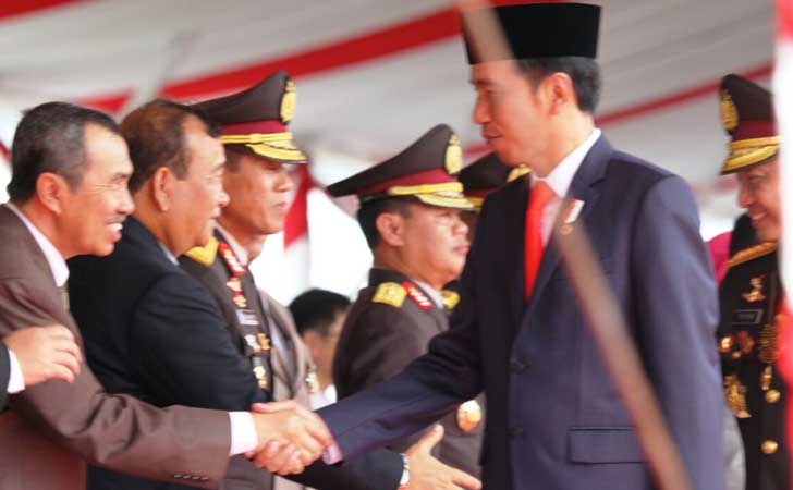 Bupati-Syamsuar-Salaman-dengan-Presiden-Jokowi.jpg