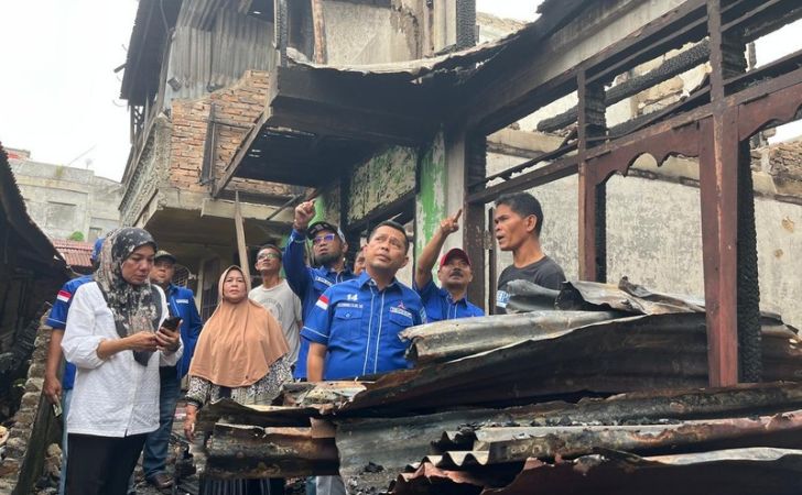 Demokrat-Pekanbaru-menyalurkan-bantuan.jpg