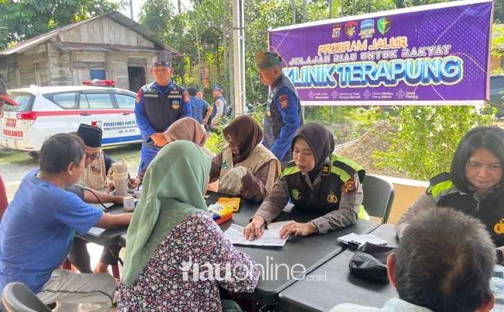 Ditpolairud-Polda-Riau-Bawa-Klinik-Terapung-dan-Kapal-Pustaka-ke-Pesisir-Teluk-Leok.jpg