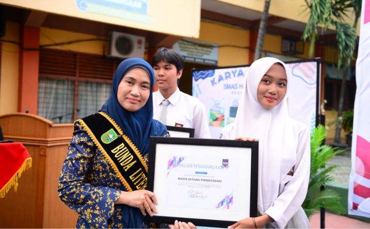 Henny-Sasmita-Wahid-Tekankan-Literasi-Bentuk-Individu-Berdaya-Saing-Global.jpg