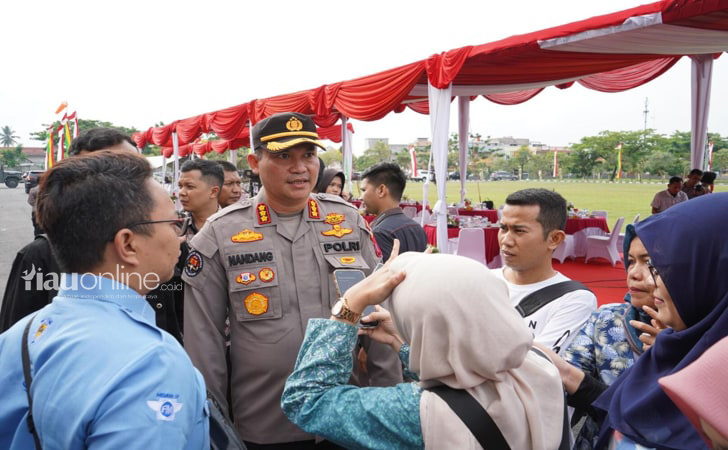 Kabid-Humas-Polda-Riau-Kombes-Pol-Nandang.jpg