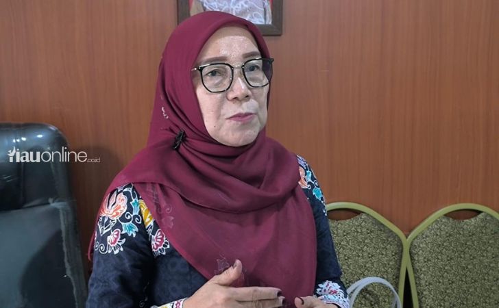 Kepala-SMAN-9-Pekanbaru.jpg