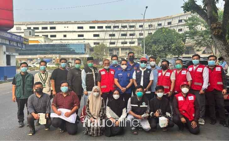 Kualitas-Udara-Memburuk-Dinkes-dan-KONI-Pekanbaru-Bagikan-2.000-Masker.jpg