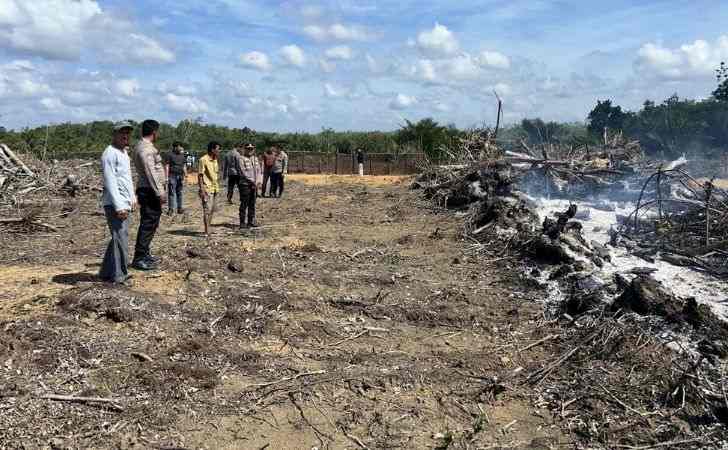 Polres-Kuansing-Tangkap-Pelaku-Pembakaran-Lahan-di-Desa-Kalimanting.jpg