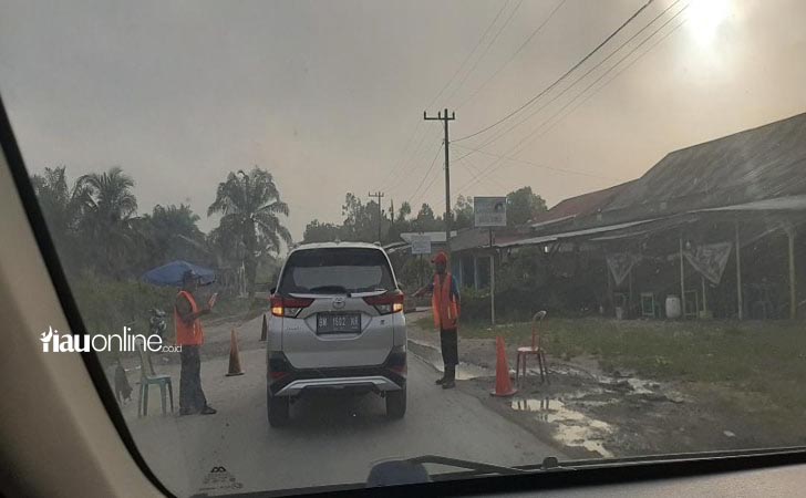 Pungli-di-jalan-nasional-kuansing.jpg