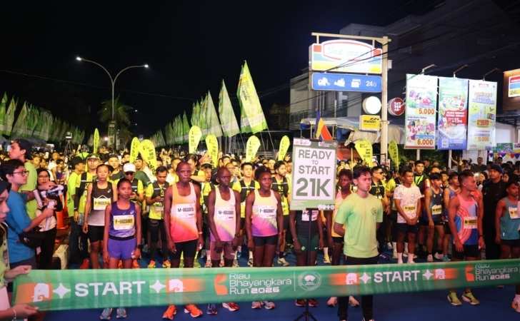 Ribuan-Pelari-Gaungkan-Semangat-Hijau-di-Riau-Bhayangkara-Run-2026.jpg