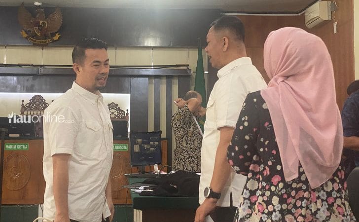 Risnandar-usai-sidang.jpg