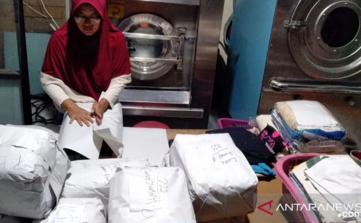 ilustrasi-Pemilik-laundry.jpg