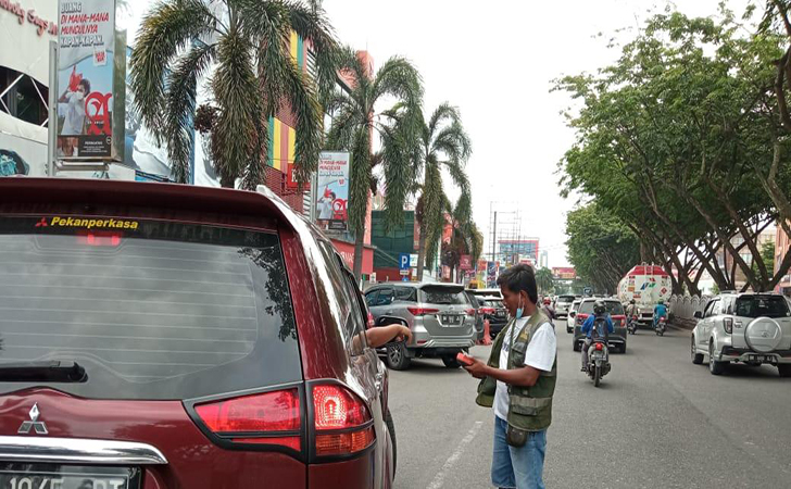 juru-parkir10.jpg