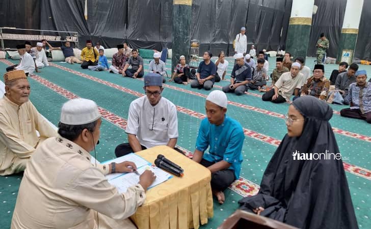 tiga-warga-medan-masuk-islam.jpg