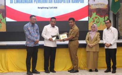 Bupati-Kampar-dan-Ombudsman-RI-Sepakati-Peningkatan-Kualitas-Pelayanan-Publik.jpg