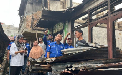 Demokrat-Pekanbaru-menyalurkan-bantuan.jpg