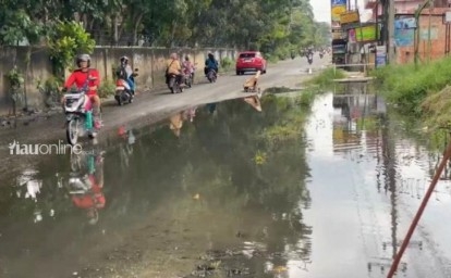 Kondisi-jalan-rusak-di-bangau-sakti.jpg
