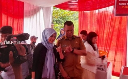 Hujan Deras saat Pilpres di Riau Bikin Partisipasi Pemilih di Pemilu 2024...
