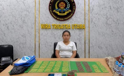 perempuan-simpan-ekstasi.jpg