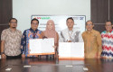 BRK-Syariah-Bersinergi-dengan-Pos-Indonesia-Permudah-Pembayaran-Pajak-Daerah.jpg