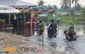 Banjir-di-lokasi-pelantikan-kades.jpg