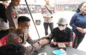 Brimob-beri-pengobatan-gratis.jpg