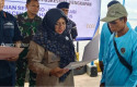 Bupati-Siak-Afni-Z-dan-nelayan.jpg