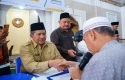 Bupati-Siak-Alfedri-menjadi-amil-zakat.jpg