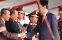 Bupati-Syamsuar-Salaman-dengan-Presiden-Jokowi.jpg