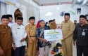 Bupati-siak-salurkan-zakat.jpg