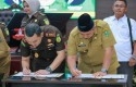 Bupati-siak-tandatangani-MoU-dengan-Kajati.jpg