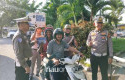 Ditlantas-Polda-Riau-Edukasi-Keselamatan-Berlalu-Lintas-dan-Bagikan-Helm-Gratis.jpg