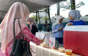 Dorong-Inklusi-Keuangan-BRK-Syariah-Fasilitasi-QRIS-UMKM-Kampong-Ramadan-Kite.jpg