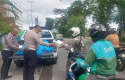 Jumat-Barokah-Jadi-Jembatan-Empati-Polantas-di-Jalan-Raya-Pekanbaru.jpg