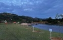 Kapolda-Tanam-Pohon-dengan-Latar-Belakang-Hutan-Gundul-di-Desa-Tanjung-Belit.jpg