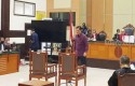 Luhut-hadiri-sidang.jpg