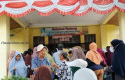 Penyaluran-bantuan-beras.jpg