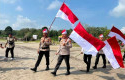 Polda-Riau-Tanam-Seribu-Mangrove-dan-Bagikan-Seribu-Bendera-di-Pelalawan.jpg
