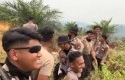 Polisi-tertawa-saat-kabut-asap.jpg