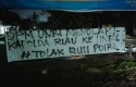 Spanduk-tolak-Kapolda-ke-UNRI.jpg