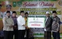 Syamsuar-serahkan-bantuan-di-rohul1.jpg