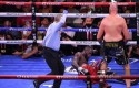 Tyson-Fury-jatuhkan-Deontay-Wilder.jpg