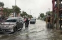 banjir-di-Jalan-HR-Soebrantas.jpg