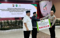 baznas-serahkan-zakat-ke-polda.jpg