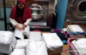 ilustrasi-Pemilik-laundry.jpg