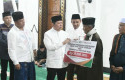 penyerahan-bantuan-brk-di-kuansing.jpg